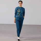 Organic Cotton Unisex Tracksuit | Gold & black tattoo motif on stargazer blue